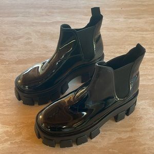 Black patent lug sole platform boot
